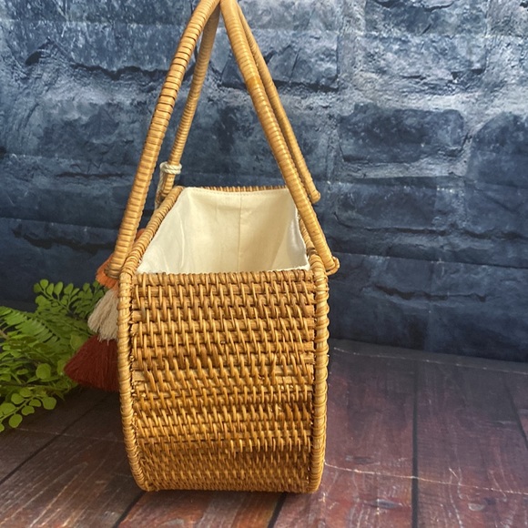 Crescent Woven Handbag with tassel detail and cinch bag interior - Picture 7 of 11